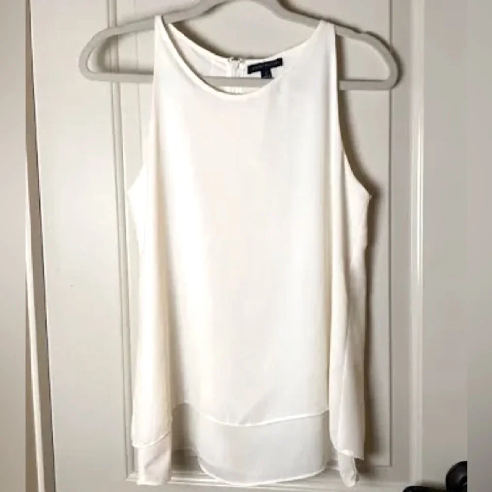 Sleeveless white blouse. Chiffon Layered bottom and longer back. Large - Picture 11 of 13